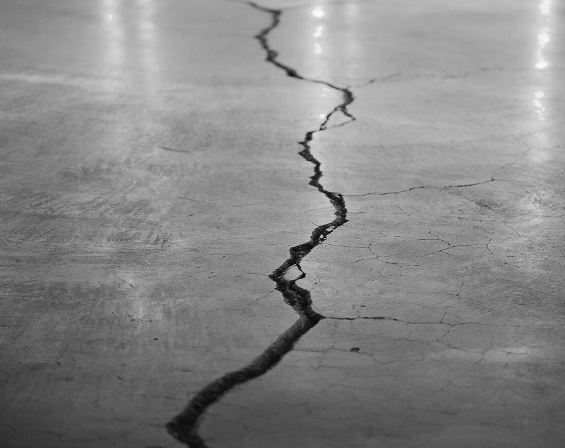 Concrete floor crack in need of repair