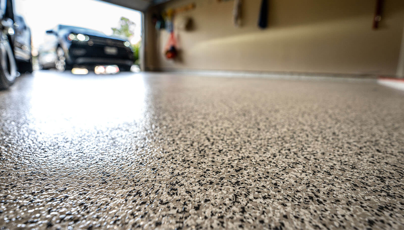 Repaired garage floor with epoxy coating